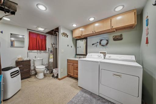 Shower, toilet, Sink and laundry area