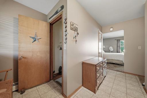 Large entry from road with tons of cabinets and closets