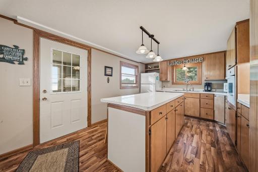 Walk right out kitchen door to the lake and your stamped concrete patio