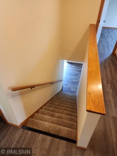 Newly carpeted stairway with fresh painted ugust 2026