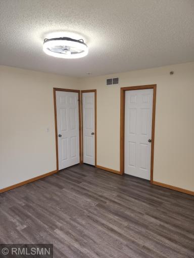 Master suite with extra storage closet