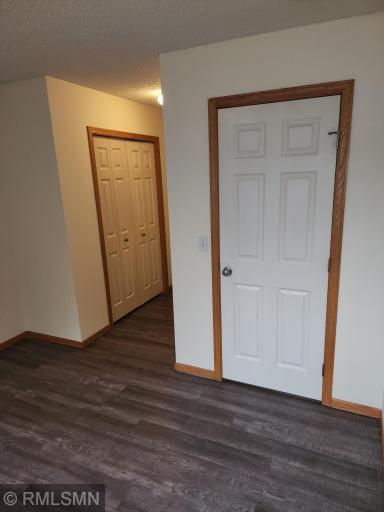 2nd bedroom with walk through closet hall to walk thru bath