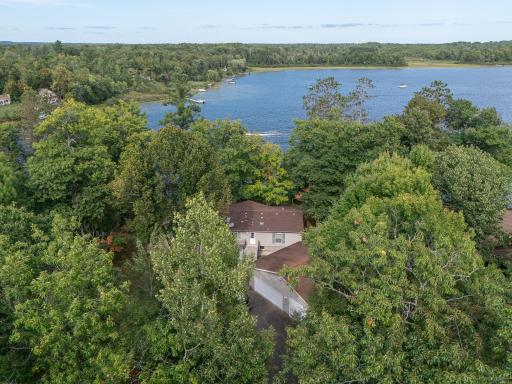 Aerial view of Mary Lake and property, nestled amongst trees for privacy