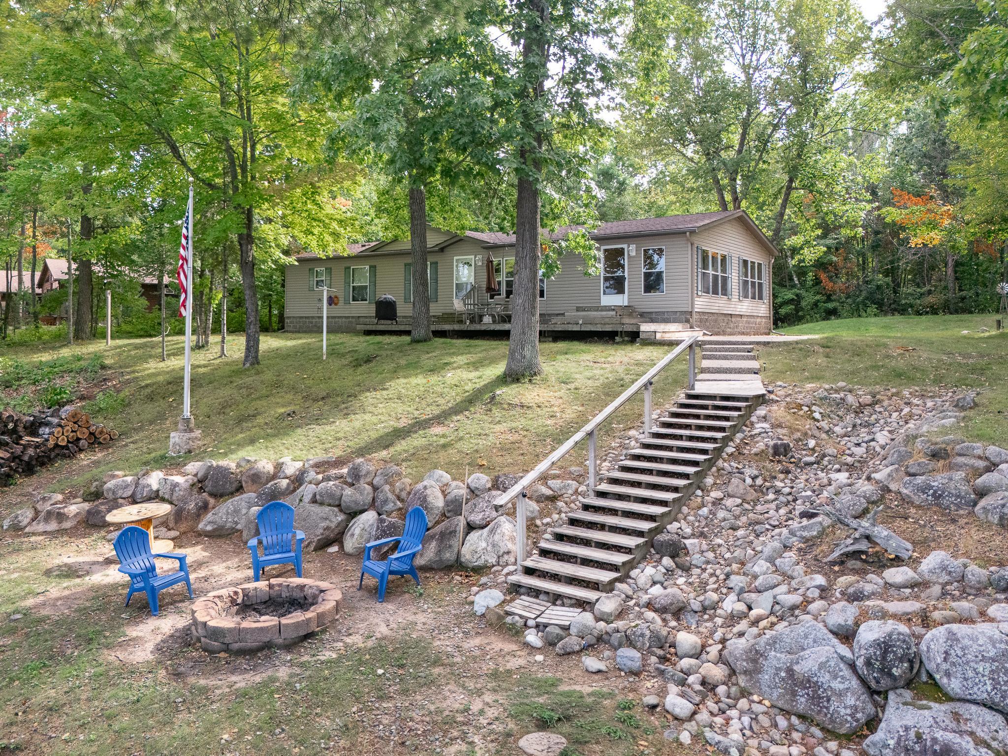 Level yard with easy steps to the firepit area