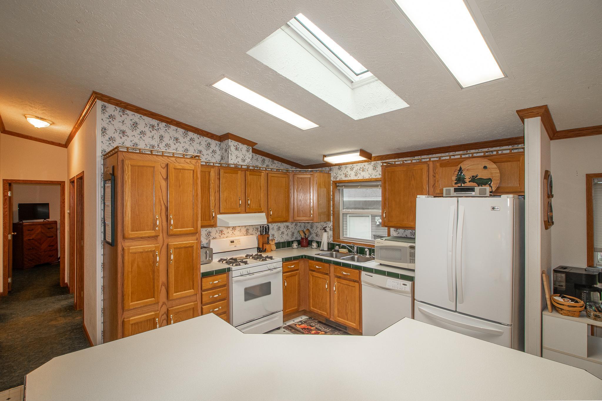 Functional kitchen with extra storage in the angled island.