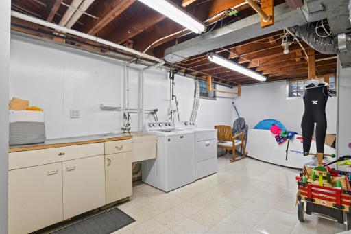 Large lower level laundry/utility room offers ample storage. 22'x15'.