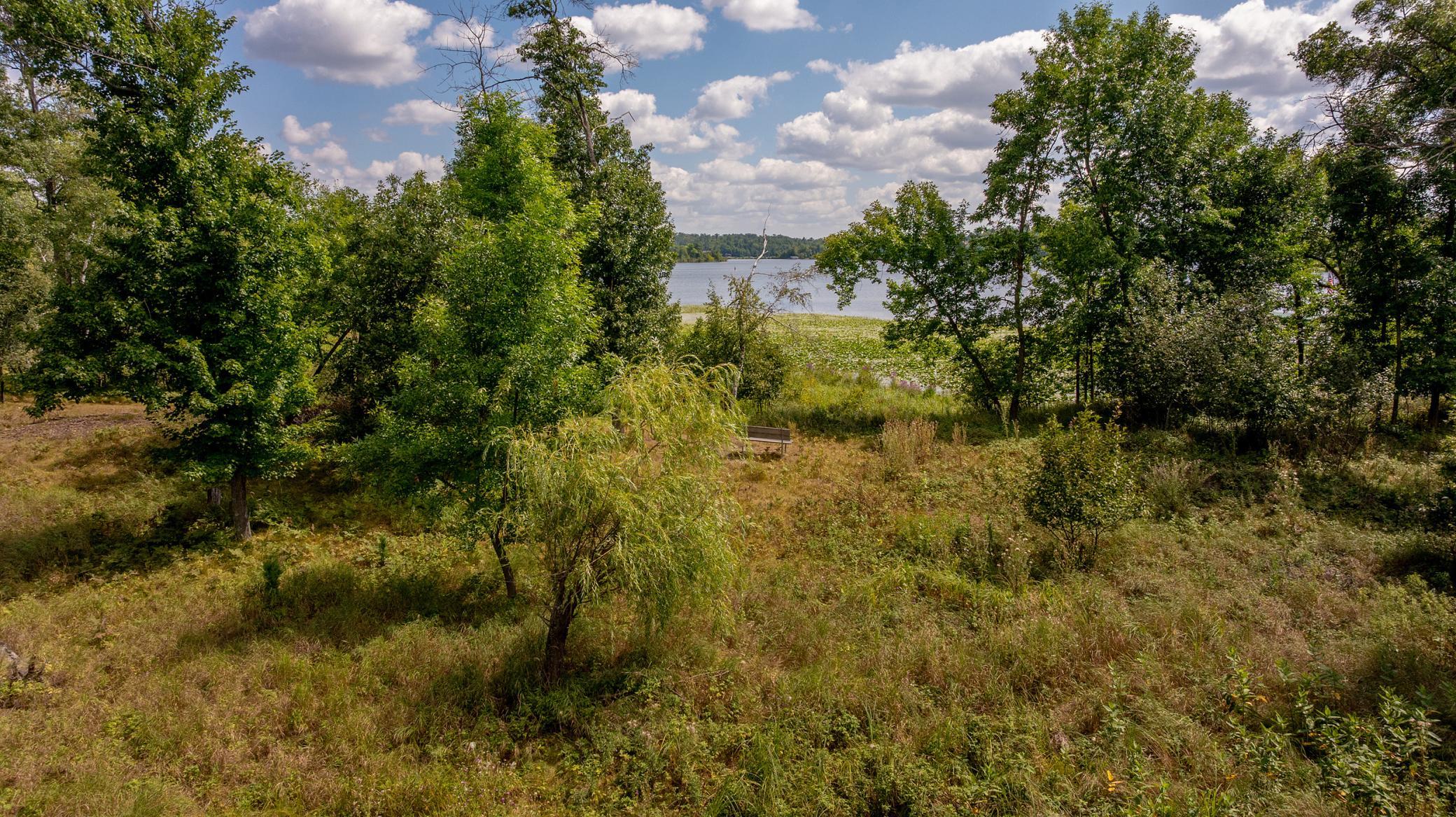 Private peninsula setting with expansive lake views