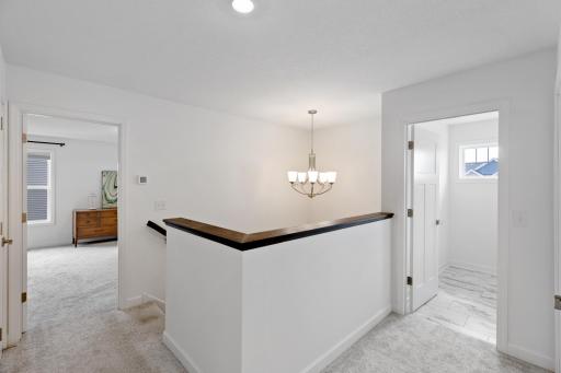 Four bedrooms upstairs plus the laundry!