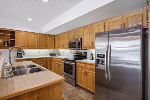 Stainless appliances-an abundance of quality Hickory cabinets (with pantry)-no shortage of prep and storage space