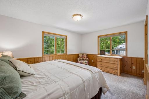 Roomy owner's suite with two double casment Andersen windows. According to Andersen's records, all windows were replaced in 2011 and they look like new!
