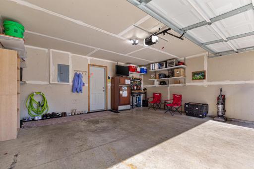 Brand new garage door opener ($1400). Refrigerator and TV can stay