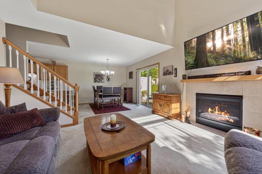 Gas fireplace and open living/dining room