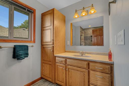 Private primary bath was just fully remodeled in August! Offering all new cabinetry, tile floor, soaking tub, and tile shower surround. You will enjoy all this new bathroom has to offer.
