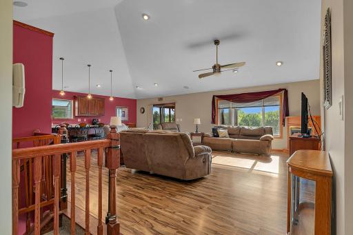 View of the open living space from the foyer area. This home is modern and offers 3108 FSF, large vaulted ceilings, and is move-in ready!