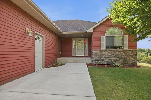 Welcoming front entry porch area. Home has new sidewalk and new brick