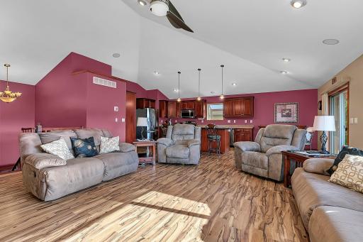 Large open concept spacious living area with vaulted ceilings and can lighting & surround sound. Great for entertaining and family time.