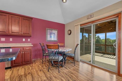 Nice dining area perfect for enjoying the sunrise views this property has to offer. The deck is convenient and makes grilling a breeze.