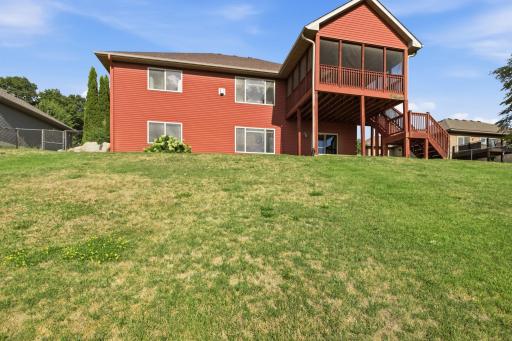 View from the fence/road area. This home offers so many great sought after features and is sure to impress. Come take a look!