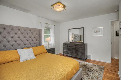 Original hardwoods flow through each bedroom