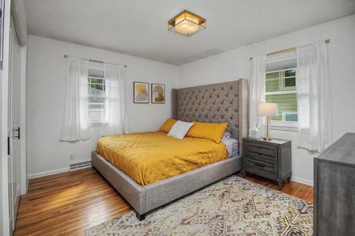 Primary bedroom fits a King bed with plenty of space left