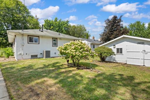 The Back Yard Features a Large 14 x 9 ft Storage Shed with 6 ft Ceiling and 80-Inch Wide Door to for Easy Access to Lawn Accessories and Garden Tools.