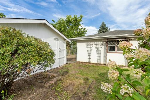 Step Out to the Fenced Back Yard. Notice That, Like the Home, the Garage also has Rain Gutters with Leaf Screens. Imagine What You can do Here, and in the Spring Watch a Variety of Perennials Come to Life...