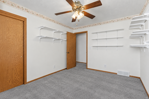 **NEW CARPET OCTOBER 8TH** Bedroom 2 is 13x10 ft. Each Bedroom has Ceiling Fans and Generous Sized Closets.