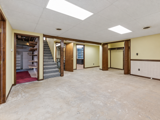 **NEW CARPET ON THE STAIRS OCTOBER 8TH** In the Lower Level the Family Room is 19x18 ft with Plenty of Space for Your Big Screen and for Lounging. A Walk-In Storage Closet is at Right...