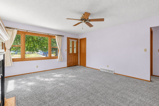 **NEW CARPET OCTOBER 8TH** This View Showcases the Picture Window and Coat Closet with Pocket Door. All Double Hung Windows on the Main Level Open "Top Down or Bottom Up" and Tilt in for Easy Cleaning.