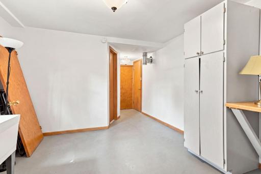 The large laundry room has a lot of storage space.