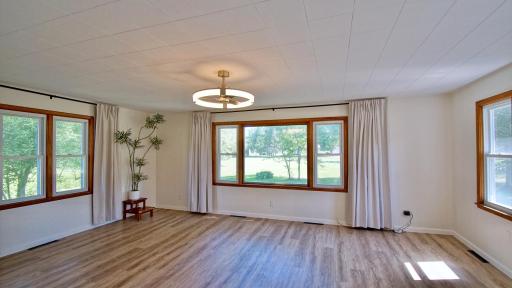 Large picture windows surround the living space offering lots of light and gorgeous views from every angle.