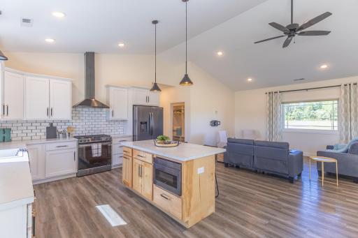 Open kitchen and living area designed for comfortable everyday living and entertaining.