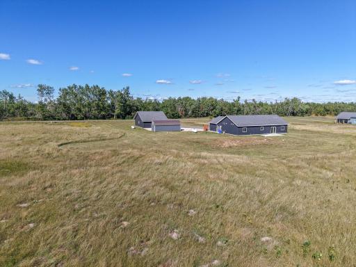 Nearly 3 acres provide plenty of open space around the home and outbuildings.