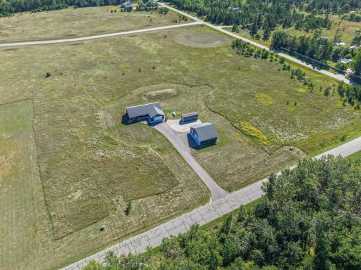 Aerial property overview showing the nearly 3-acre parcel and its convenient road access.