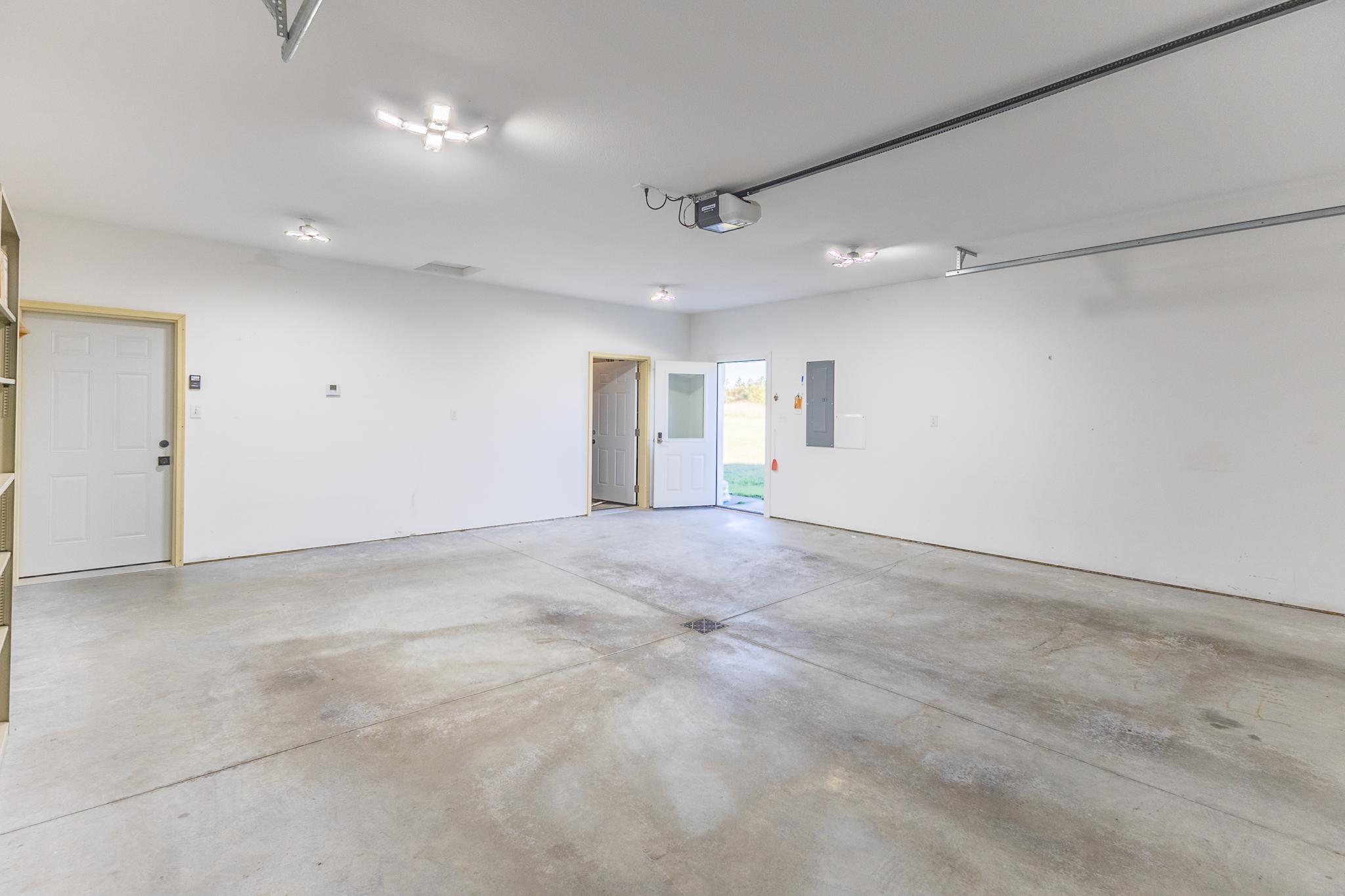 Additional attached garage view showing the generous finished interior space.