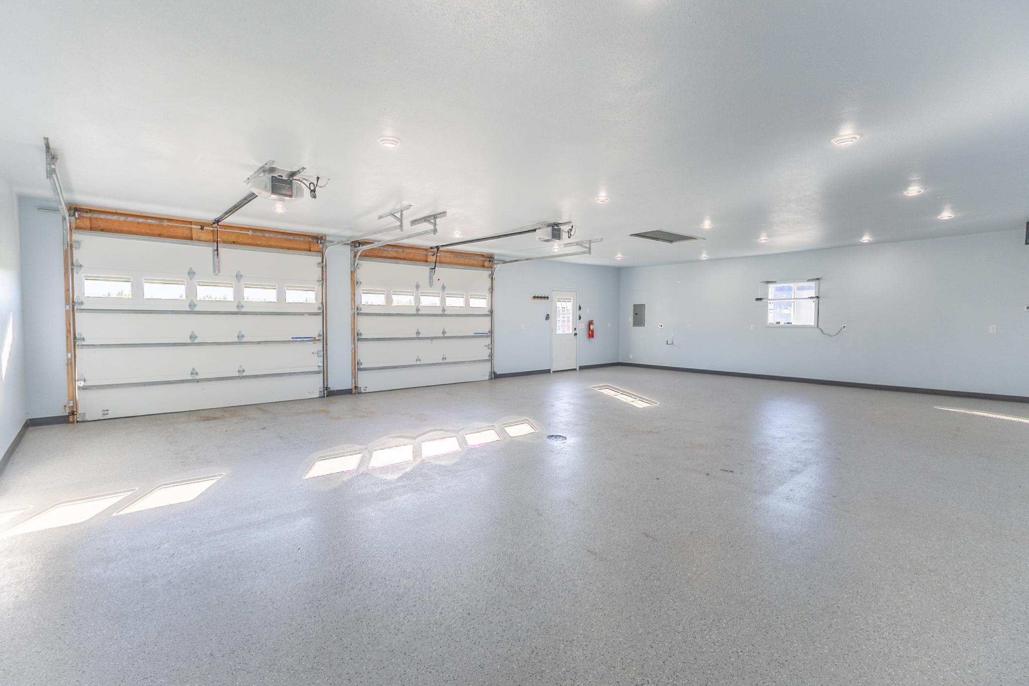30x40 heated detached shop with epoxy flooring—one of the standout features of this property.