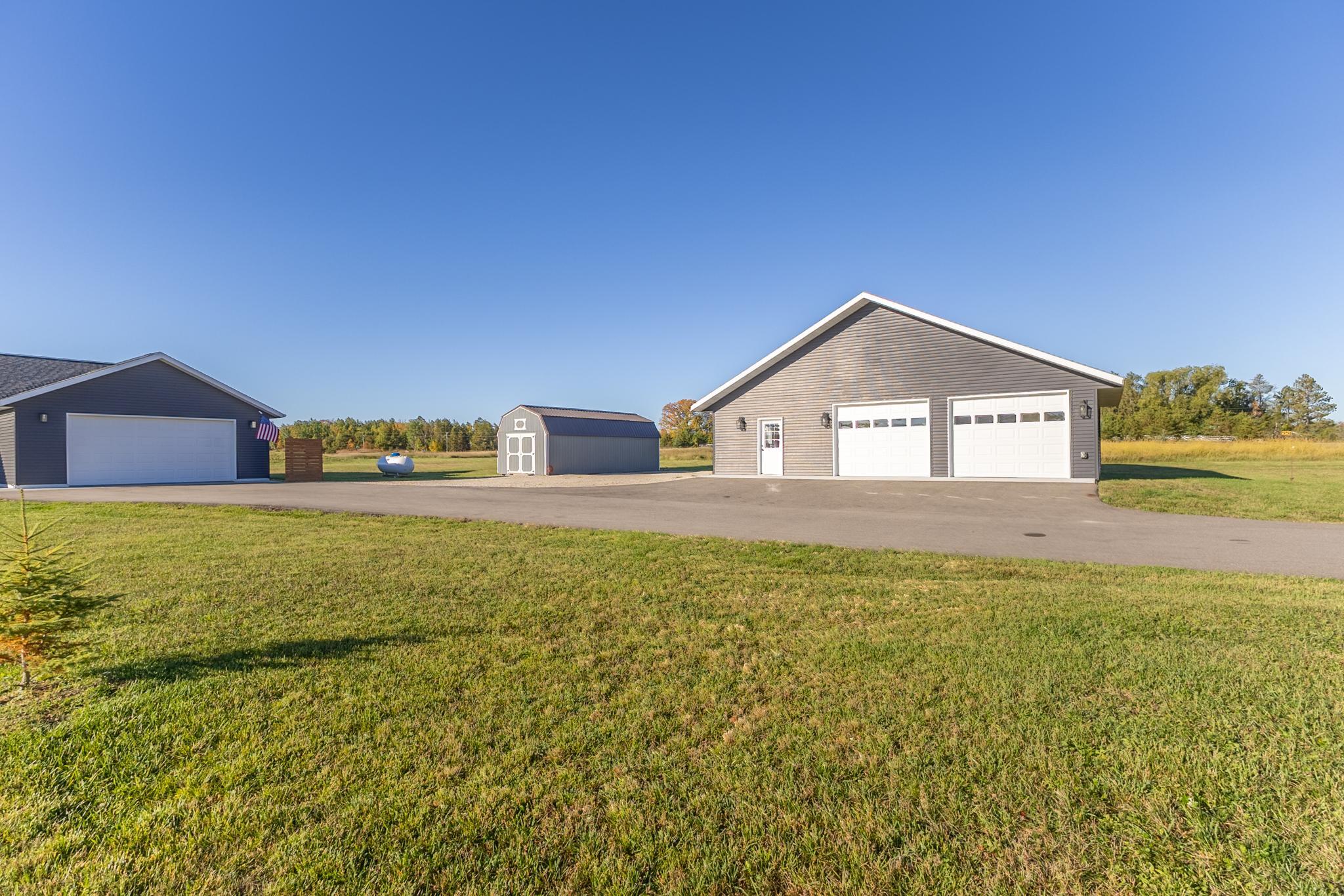 30x40 heated detached shop with paved access from the driveway.