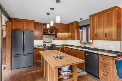 This kitchen was designed for meal prep, baking, and canning - lots of surfaces to make meals easier.
