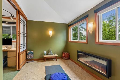 Electric fireplace and windows - great natural lighting throughout the home