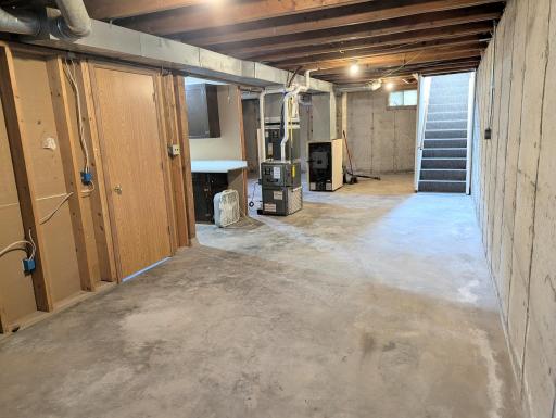 Basement has a poured foundation, drain tile and sump pump.