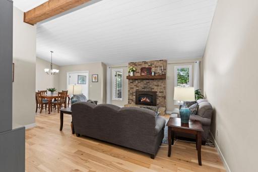 Beautiful main level living room with a fireplace