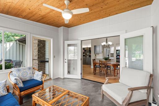 Cozy up for conversation in the porch with direct access to the deck