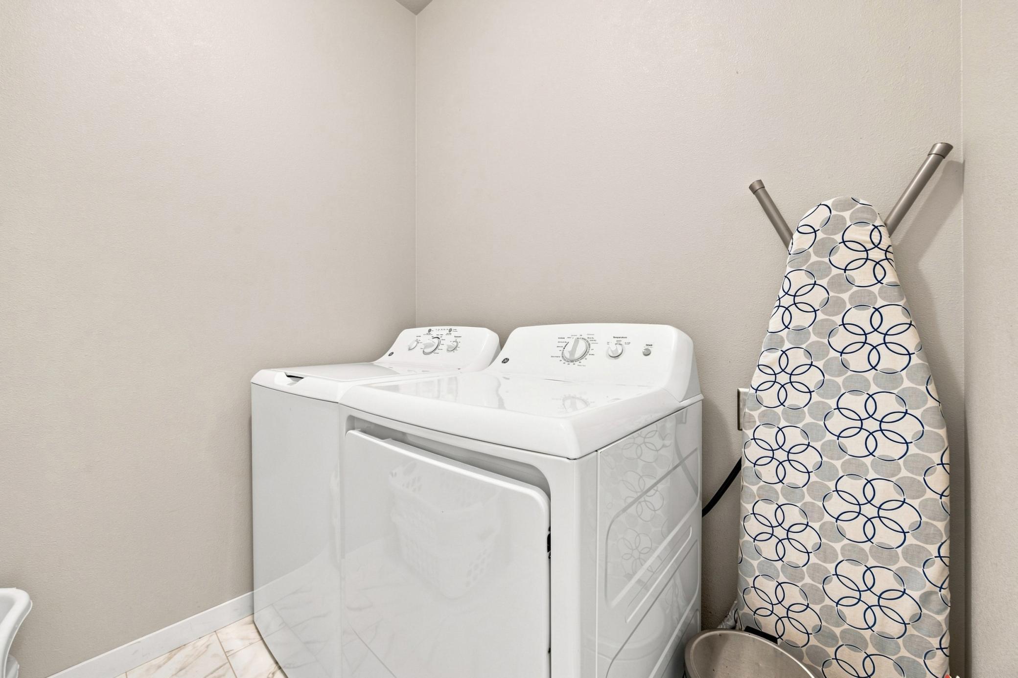 laundry room located off primary suite