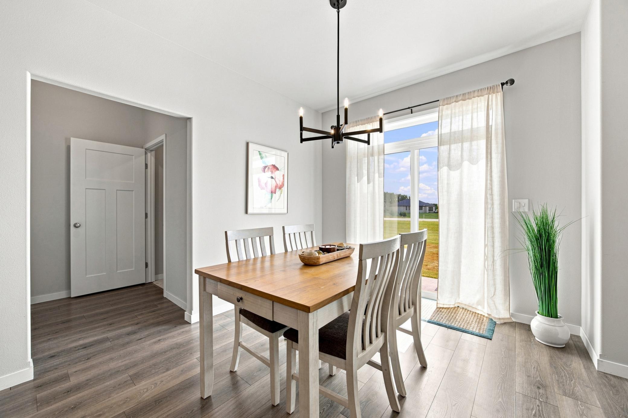 dining area towards laundry room and primary suite