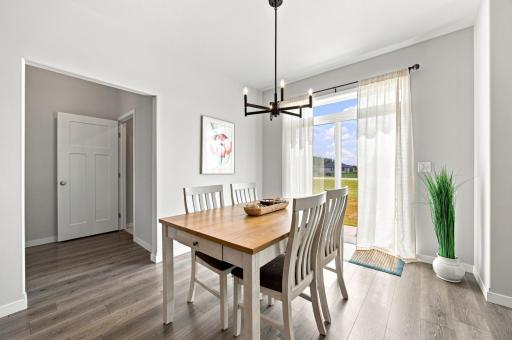 dining area towards laundry room and primary suite
