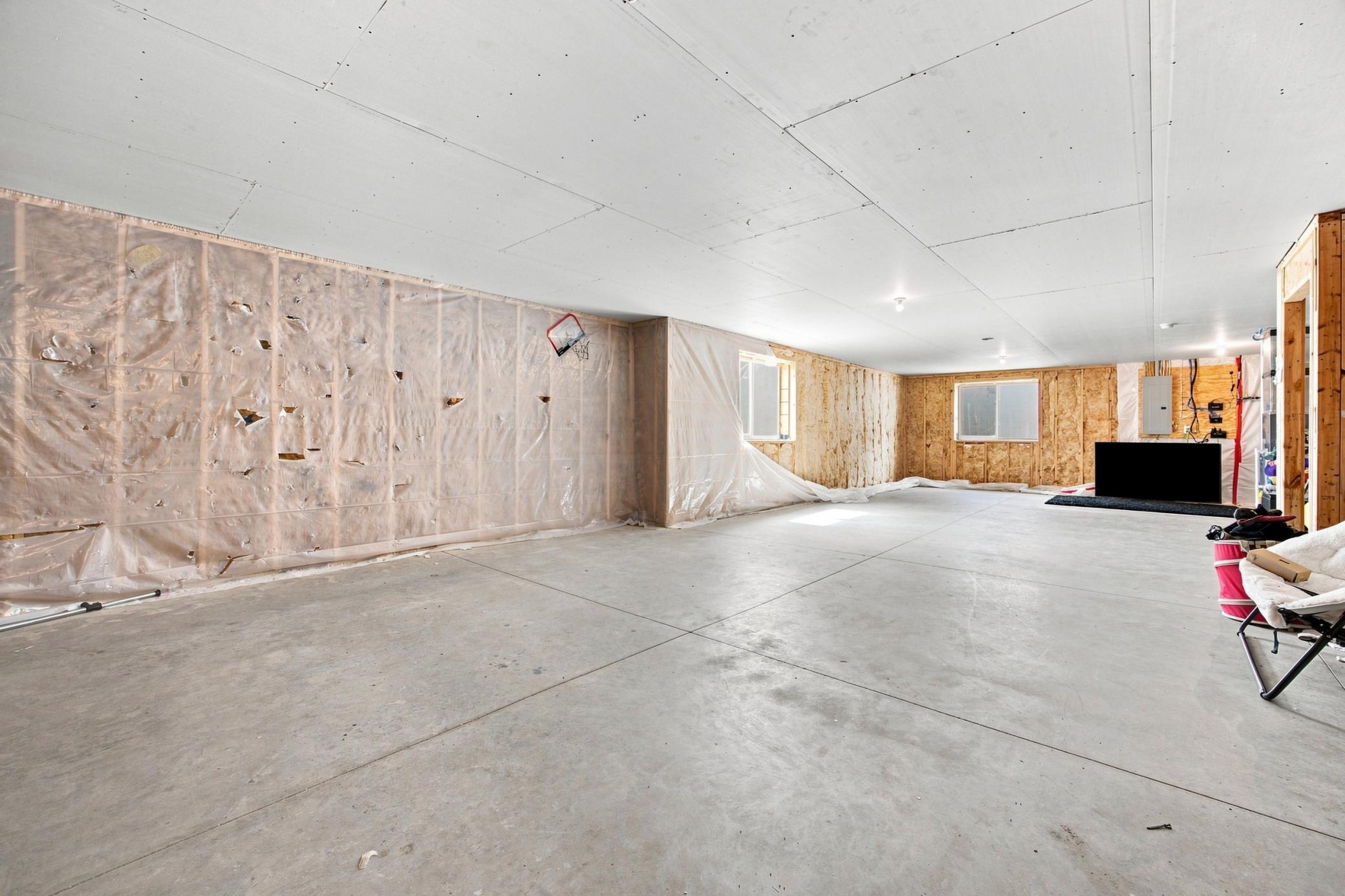 opportunity for future family room and 2 egress windows for future bedrooms + full bath