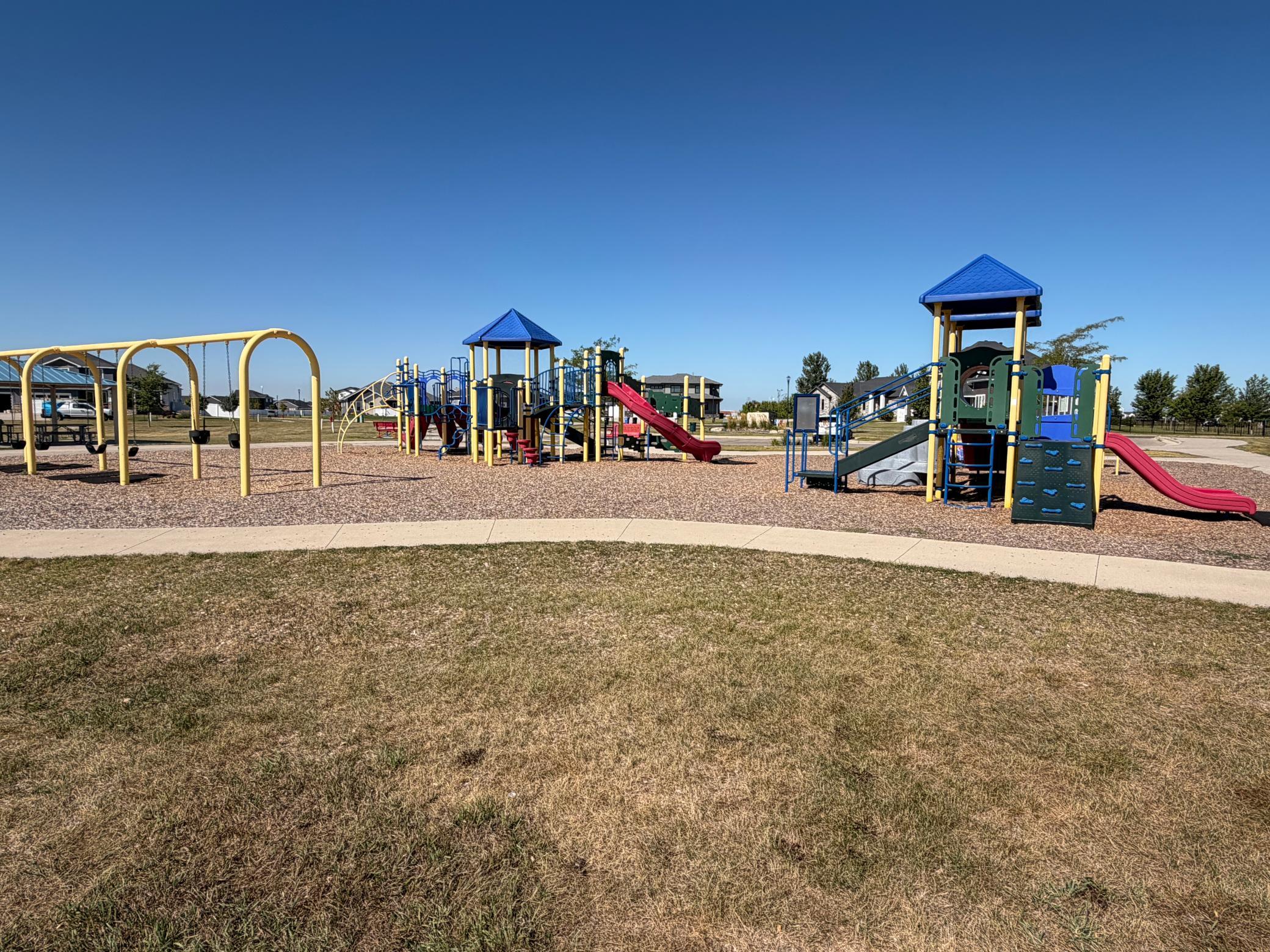 park offers large playground, basketball court, soccer nets, shelter and tables, walking path