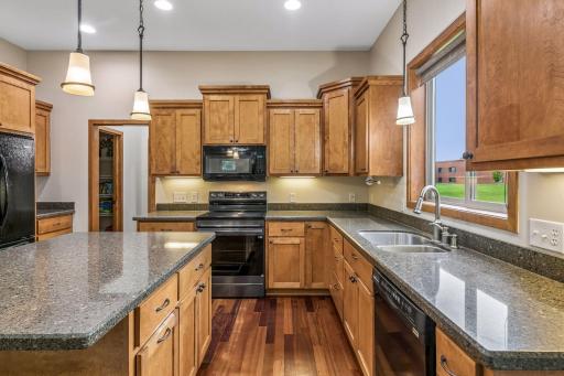 Great countertop space in your kitchen with a over the sink window which gives for a spacious feel.