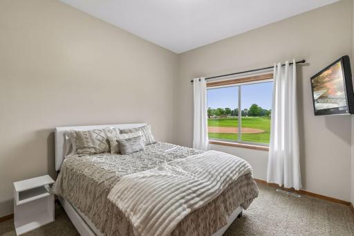 Main floor bedroom that has great natural lighting.