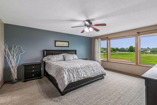 Primary bedroom on the upper level. Spacious and amazing natural lighting.
